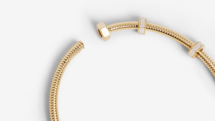 An open Ecrou de Cartier bracelet