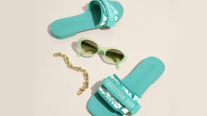 Dior Slides, Celine Oval Sunglasses, and a Tiffany HardWear bracelet.  Tiffany 