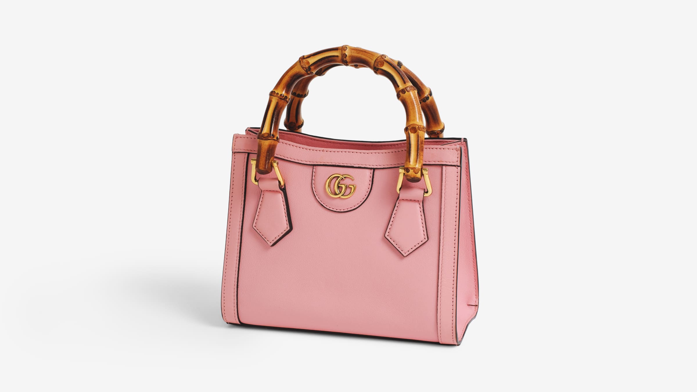 A pink Gucci Diana tote bag