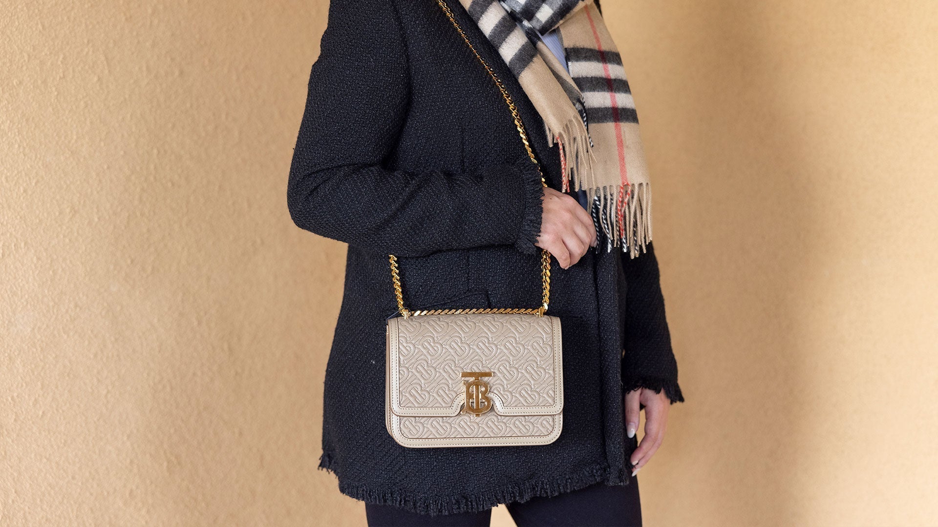model wearing burberry bag and scarf FASHIONPHILE