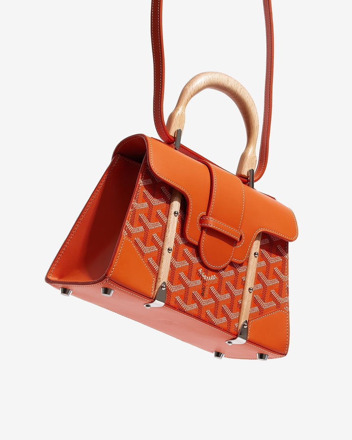 product image of orange Goyard Structured Mini Saigon on white background at FASHIONPHILE