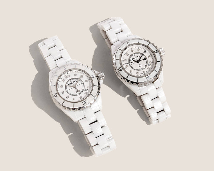 studio image of white authentic and fake Chanel J12 watch FASHIONPHILE
