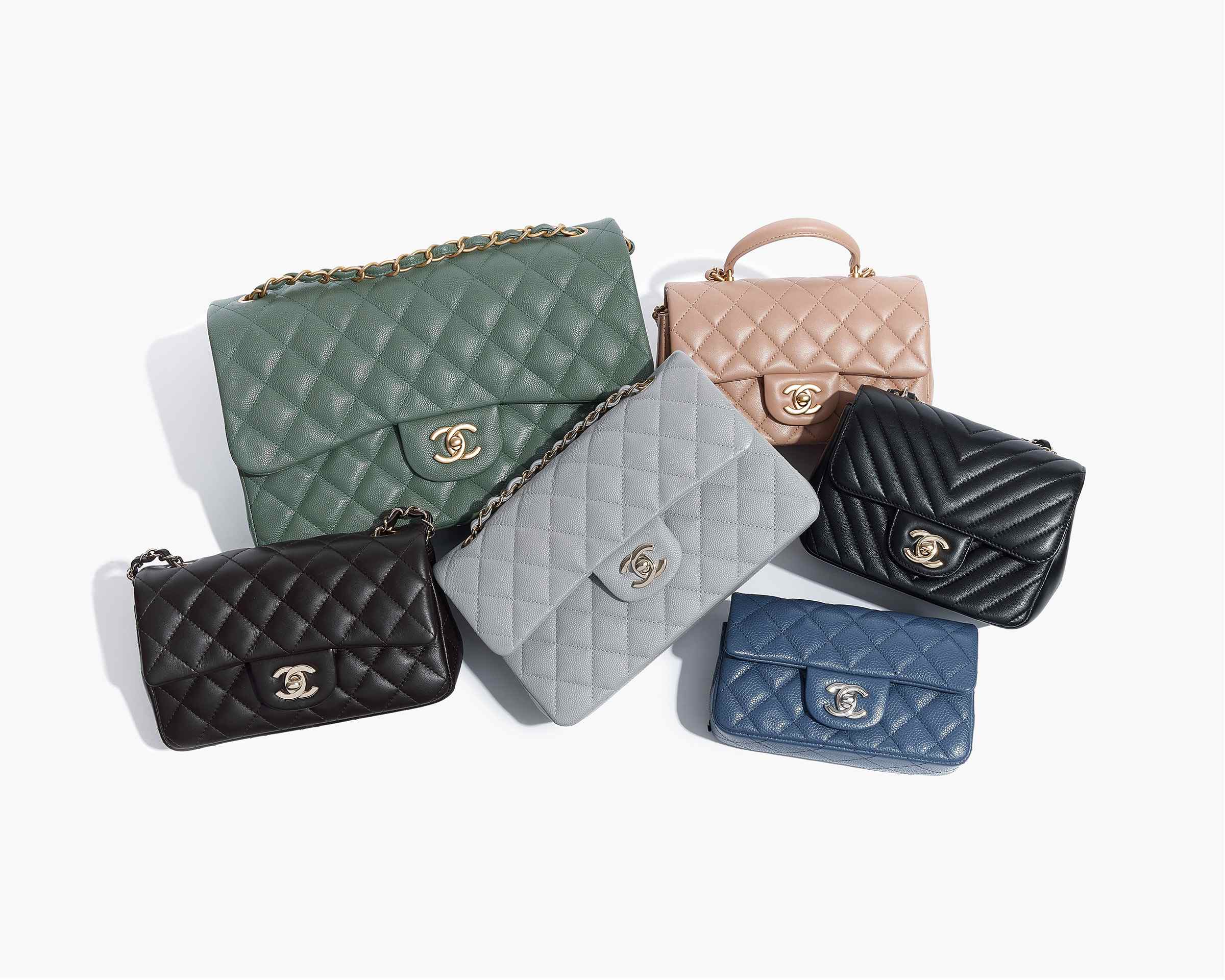 studio image of chanel flap bags grouped together FASHIONPHILE