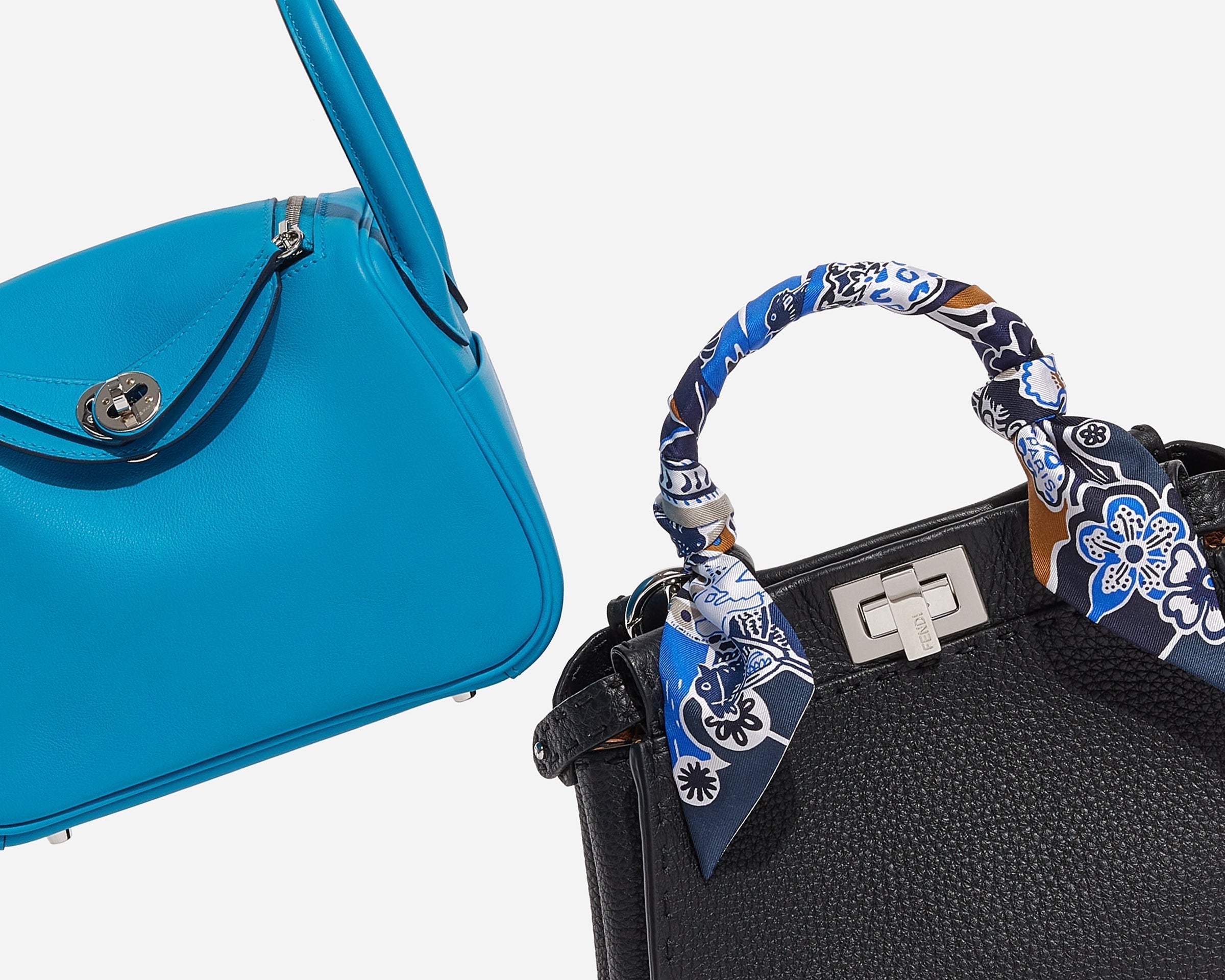 product image of blue hermes lindy bag and black fendi peekaboo on white background FASHIONPHILE
