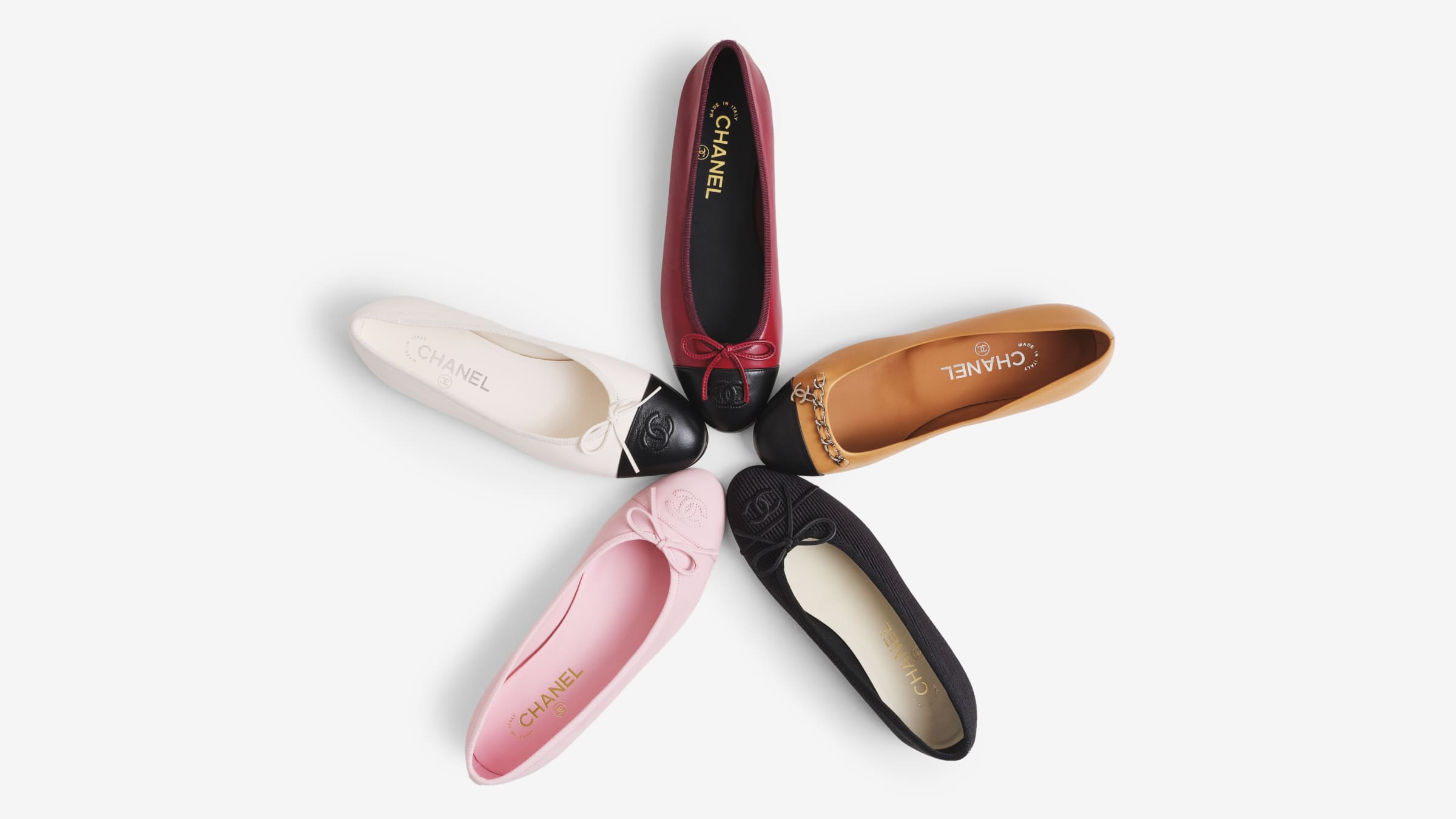 Chanel Ballet Flats arranged in a circle with the toes pointed inwards