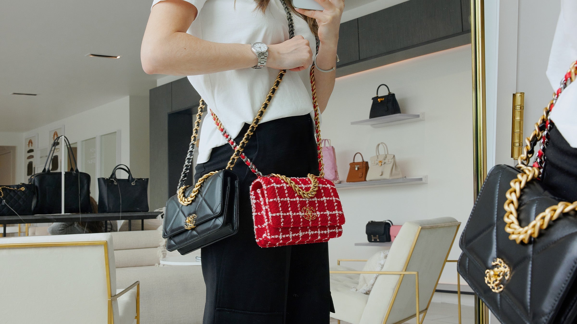 mirror selfie of girl wearing two chanel 19 wallet on chain bags worn together in FASHIONPHILE Flagship store