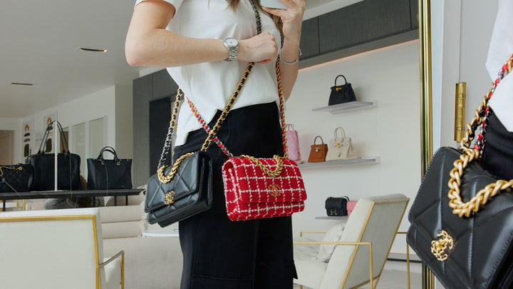 mirror selfie of girl wearing two chanel 19 wallet on chain bags worn together in FASHIONPHILE Flagship store