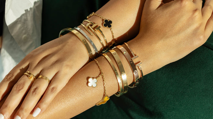 how to create a bracelet stack with pieces from van cleef & arpels, cartier, and tiffany by FASHIONPHILE