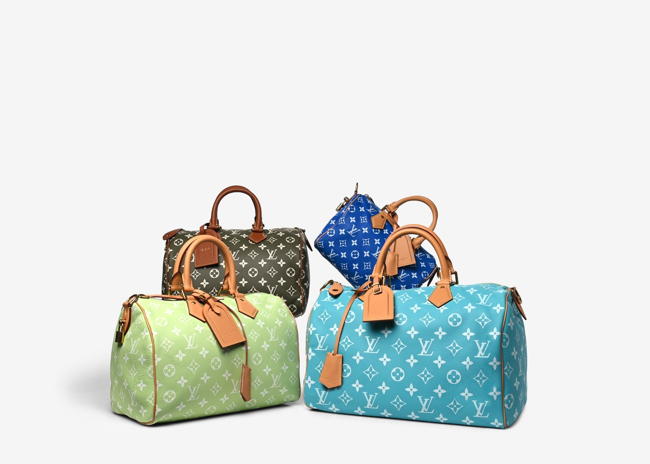 Four Louis Vuitton Speedy P9 bags in Cactus, Frozen Lime, Amethyst, and Blue