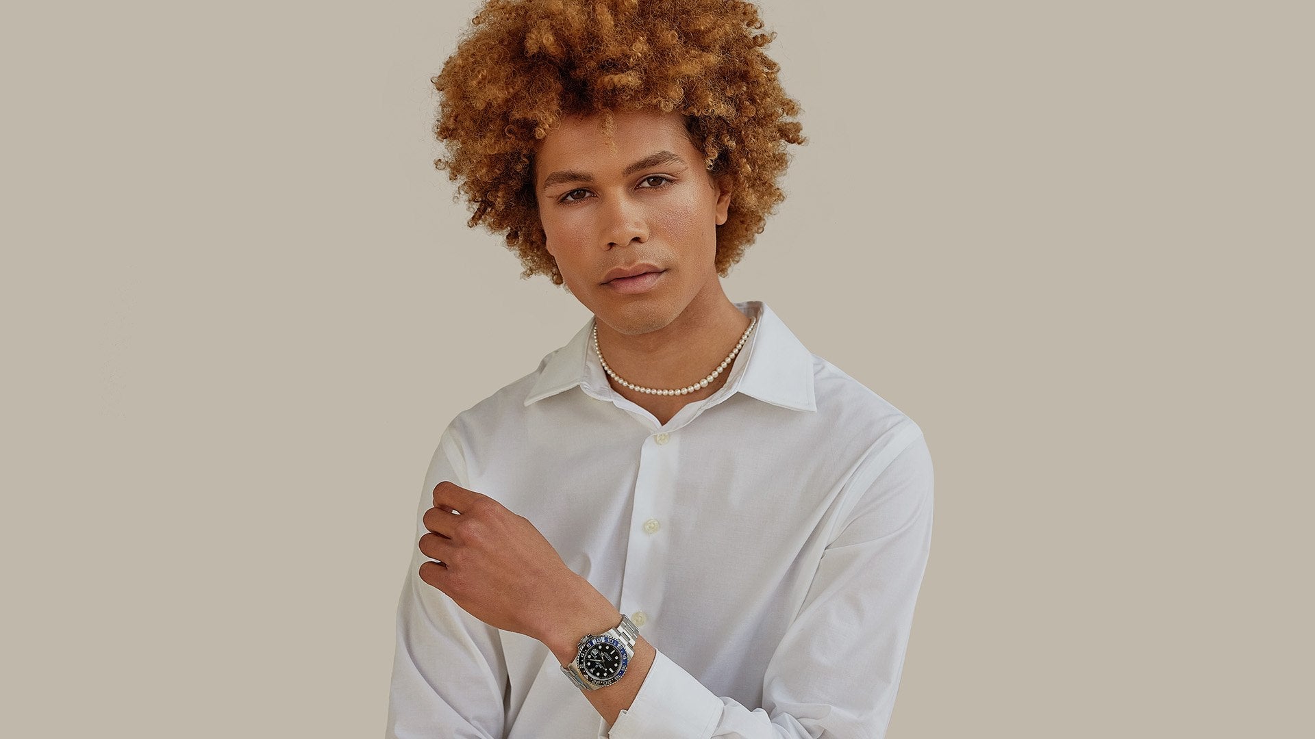portrait shot of male model wearing pearls FASHIONPHILE