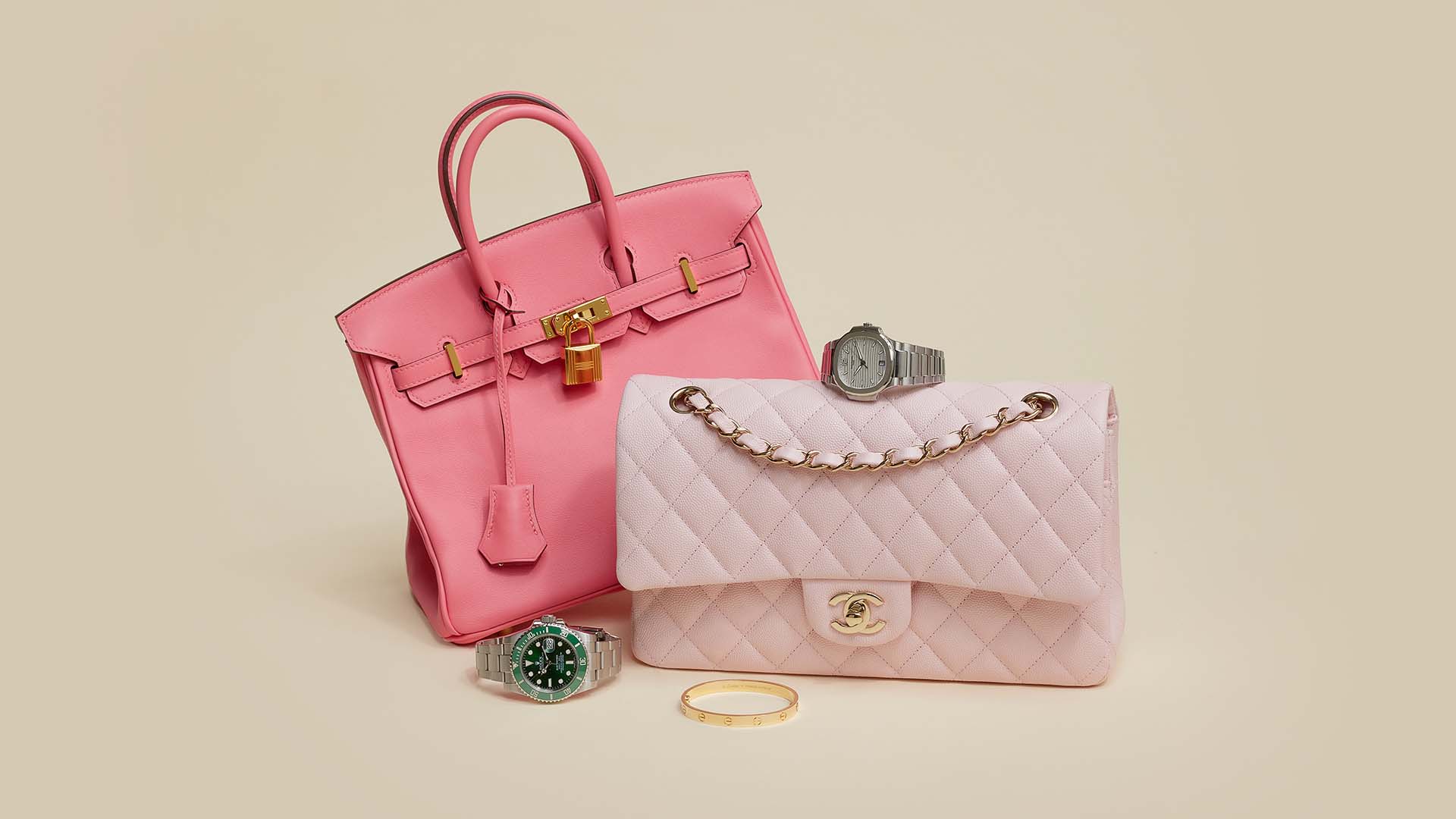 studio image of hermes, chanel, patek philippe, rolex, and cartier items at FASHIONPHILE