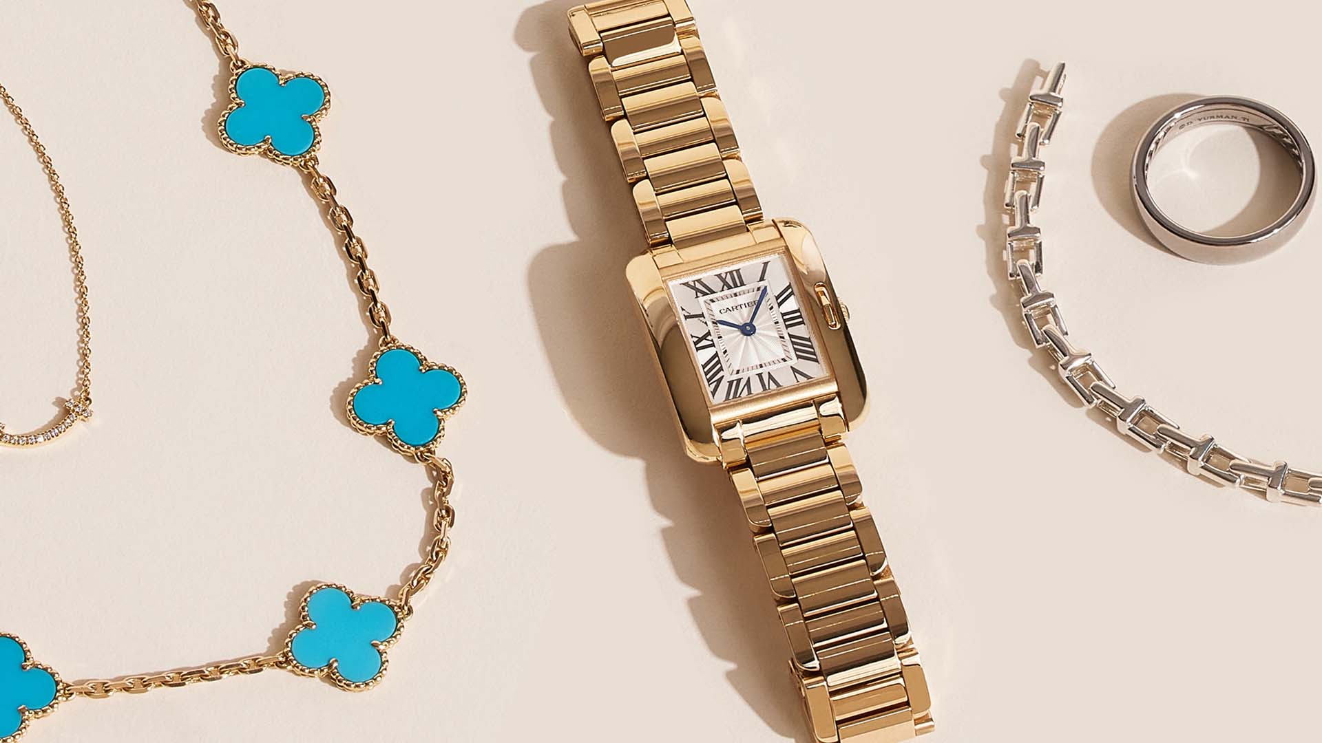 studio image of gold cartier tank watch FASHIONPHILE