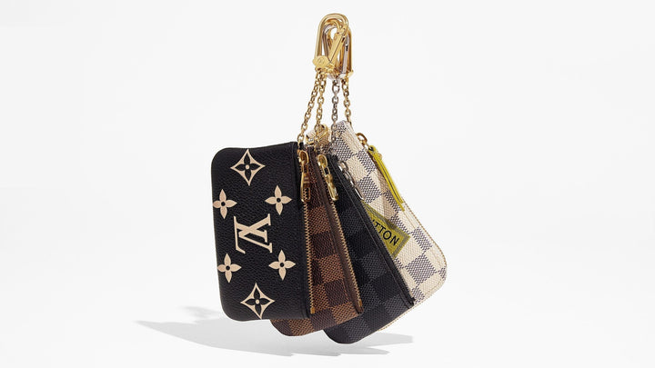 product image of Louis Vuitton Key Pouches hanging together FASHIONPHILE