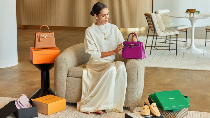 model in FASHIONPHILE's New York City Authentication Center and Showroom Shopping luxury designer bags