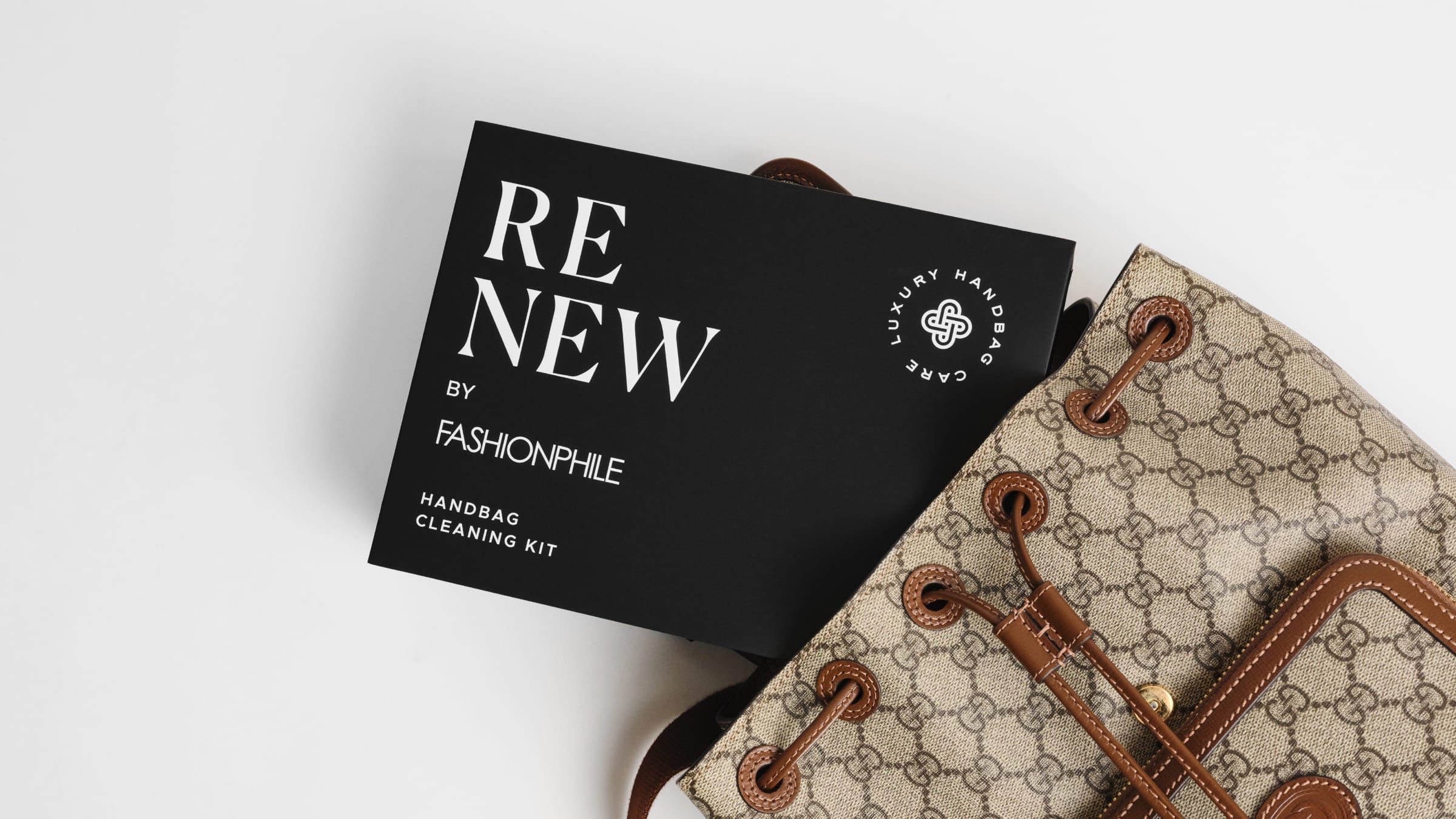 ReNew Handbag Cleaning Kit coming out of a Gucci backpack