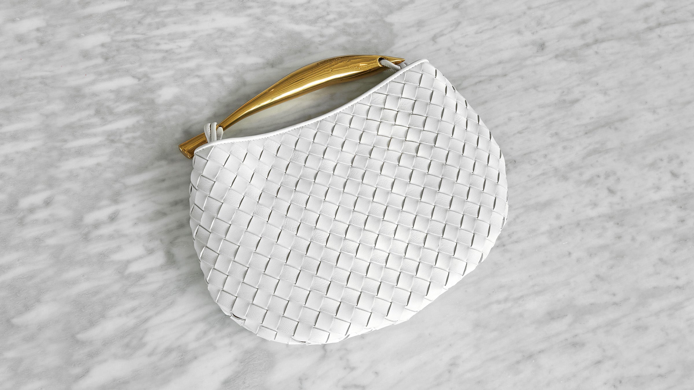an image by FASHIONPHILE of a white bottega veneta sardine bag