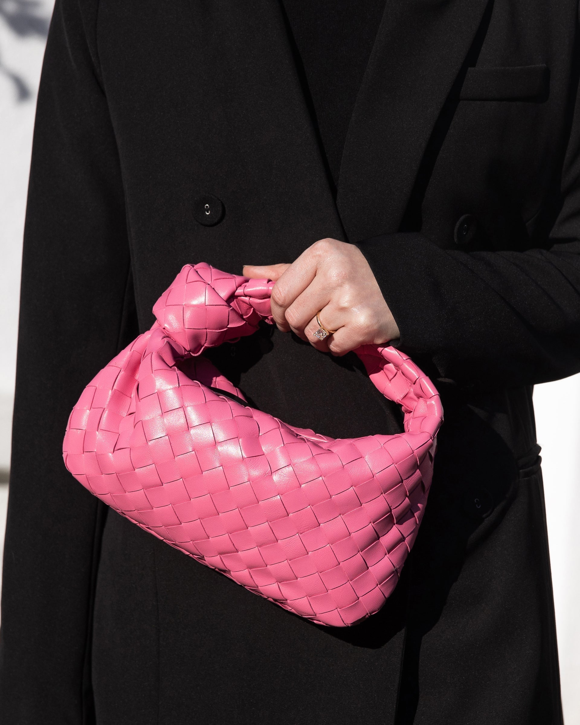 lifestyle image of model wearing pink jodie bag FASHIONPHILE