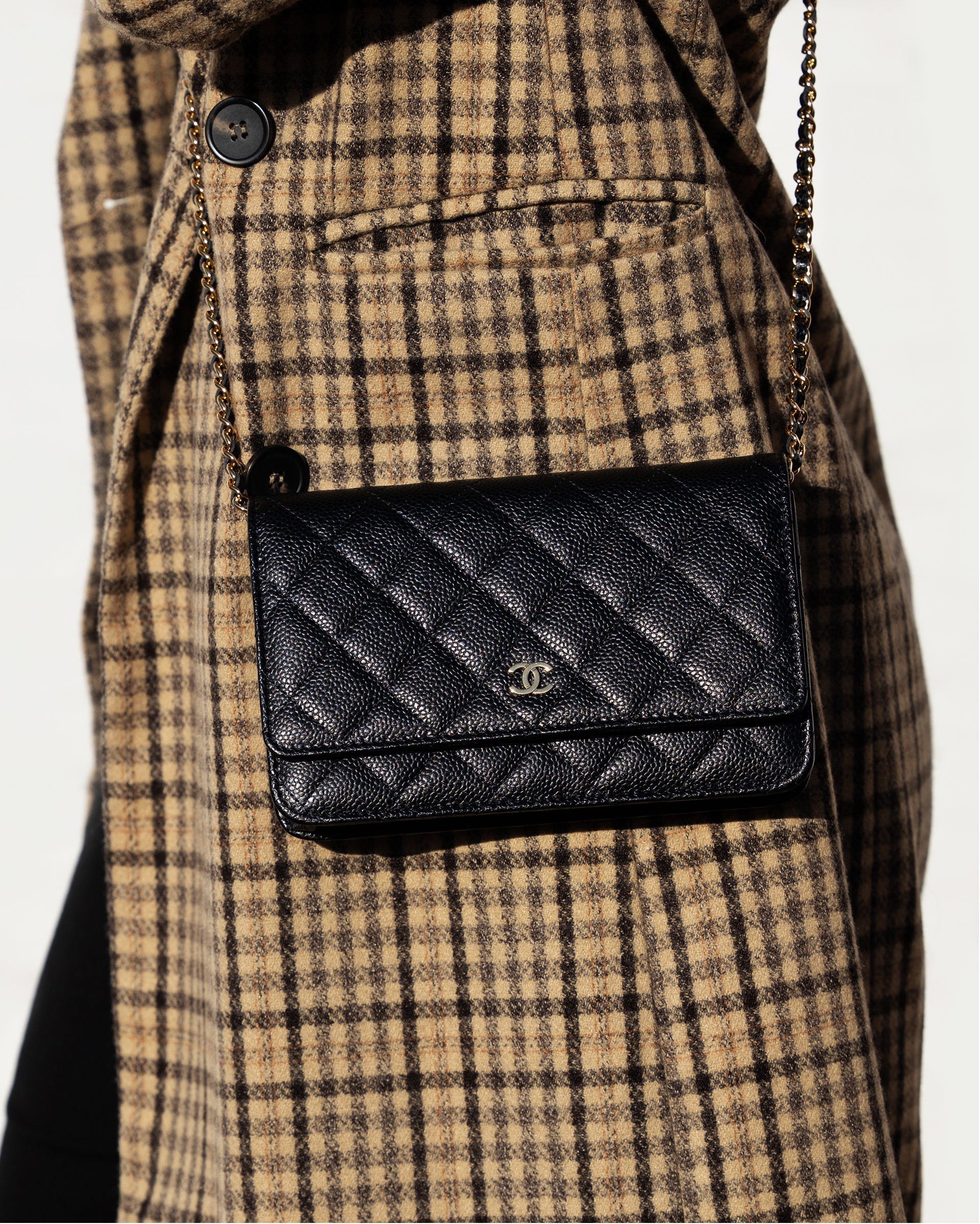 lifestyle image of model wearing chanel WOC FASHIONPHILE