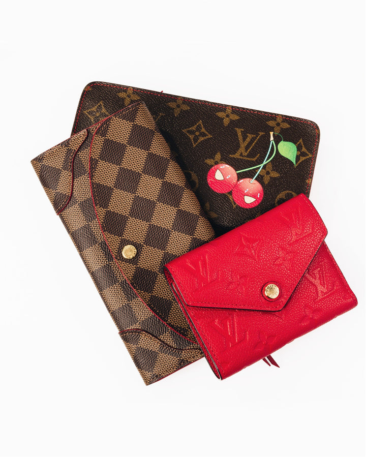 studio image of louis vuitton wallets FASHIONPHILE