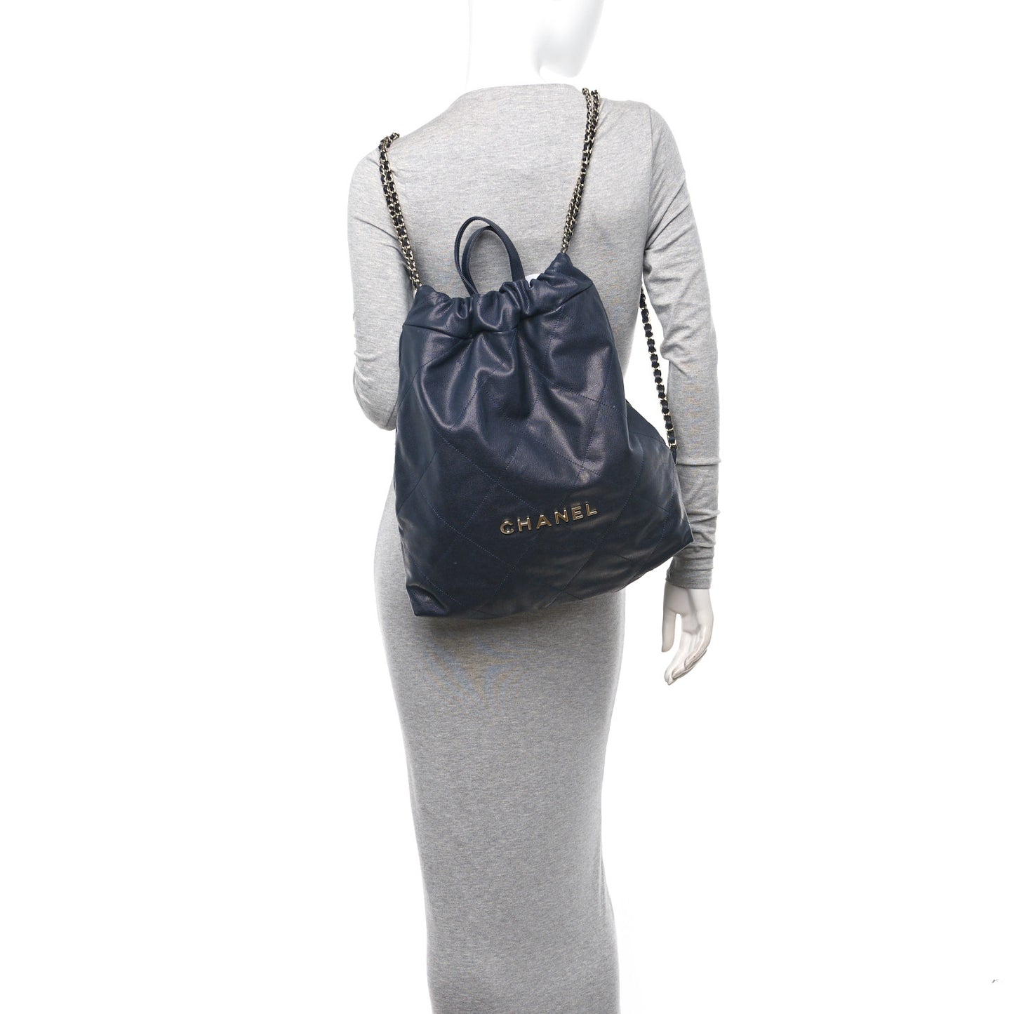 Shiny Caviar Quilted Chanel 22 Backpack Dark Blue