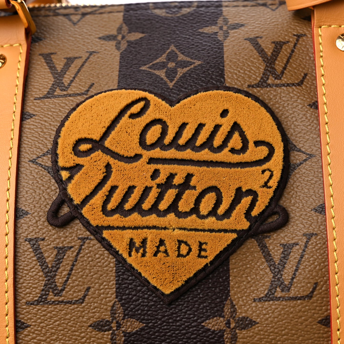 X NIGO Reverse Monogram Stripe Keepall Bandouliere 50 Brown