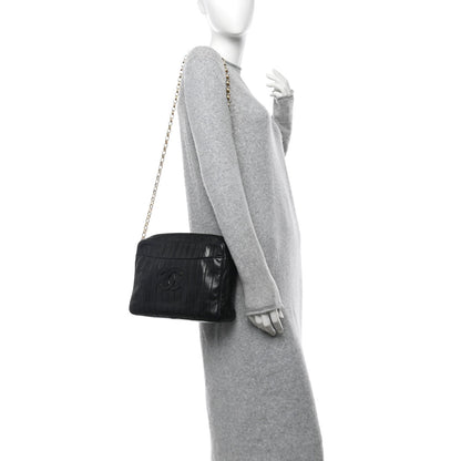 Chanel Lambskin Vertical Quilted Tassel Camera Case Black 2 of 7