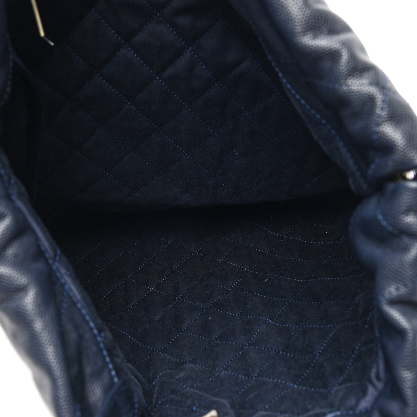 Shiny Caviar Quilted Chanel 22 Backpack Dark Blue