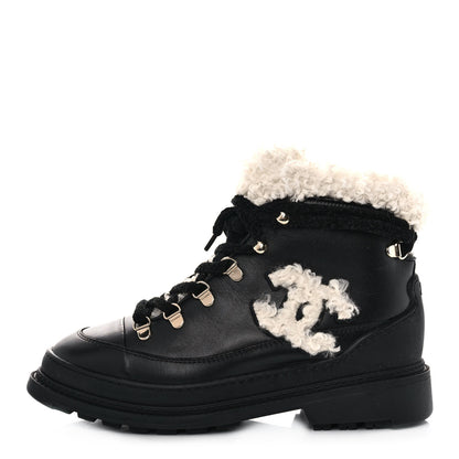 Chanel Calfskin Shearling CC Lace Up Boots 36.5 Black 1 of 9
