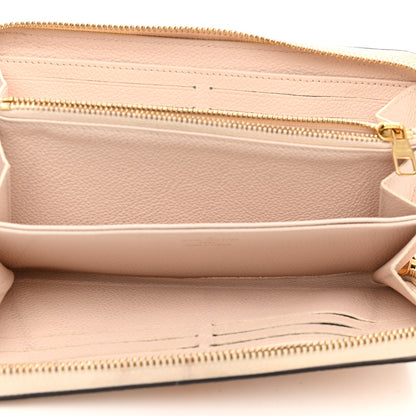 Louis Vuitton Empreinte Monogram Giant By The Pool Zippy Wallet Cream Saffron 5 of 10