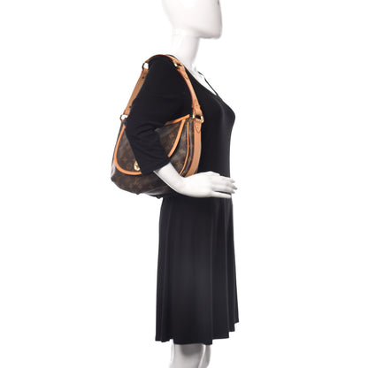 Louis Vuitton Monogram Tulum PM 2 of 10