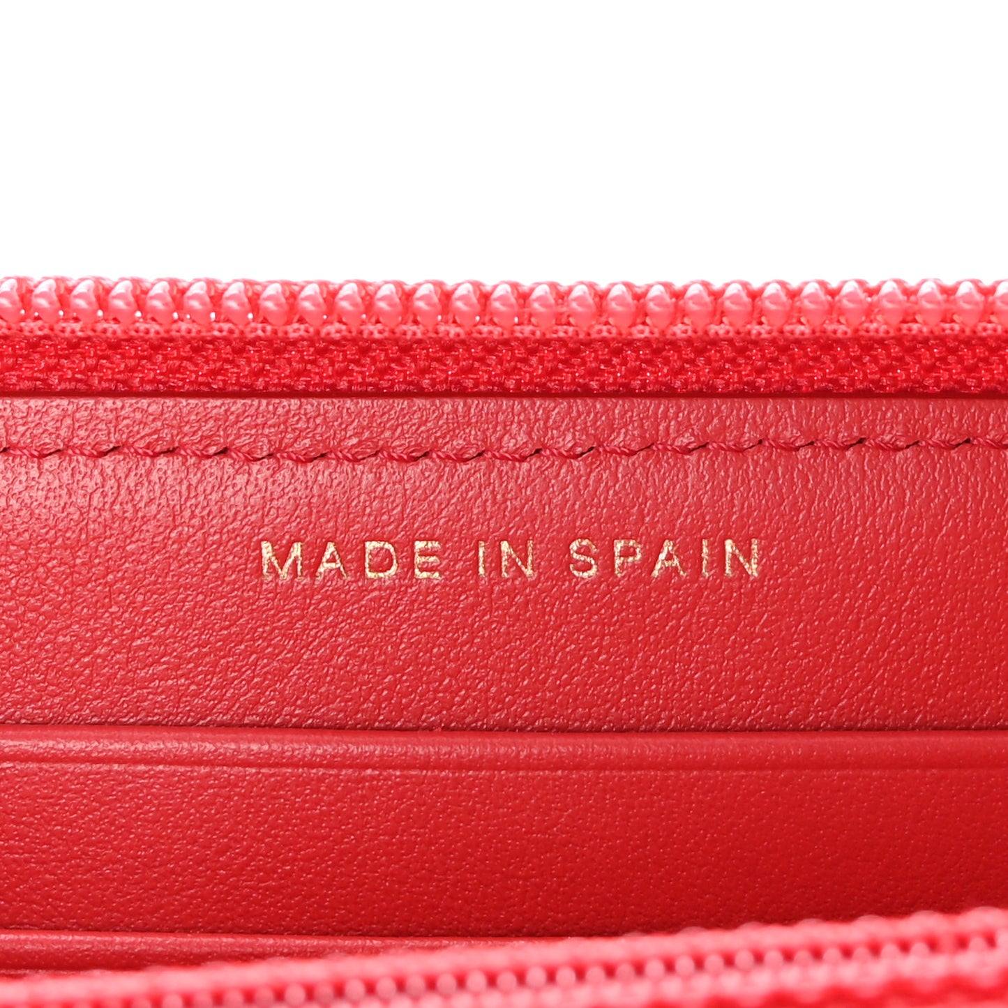 Caviar Quilted Small Boy Zip Around Wallet Red