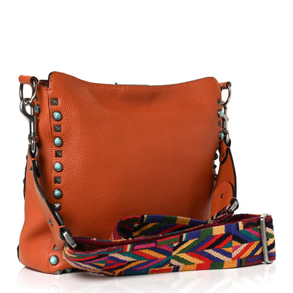 Valentino Garavani Pebbled Calfskin Small Guitar Strap Rockstud Rolling Flip-Lock Messenger Bag Orange 3 of 10