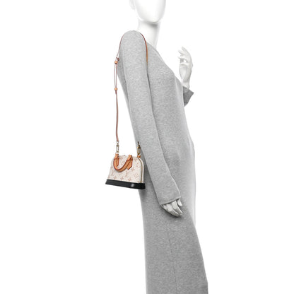 Louis Vuitton Monogram Dune Nano Alma 2 of 9