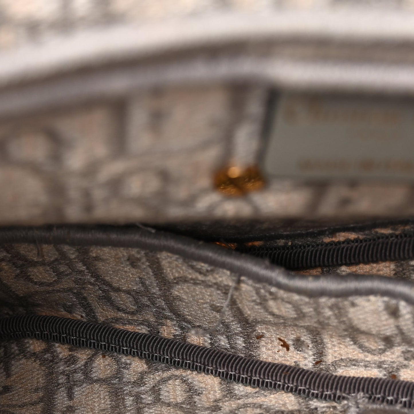 Oblique Embroidered Saddle Bag Gray