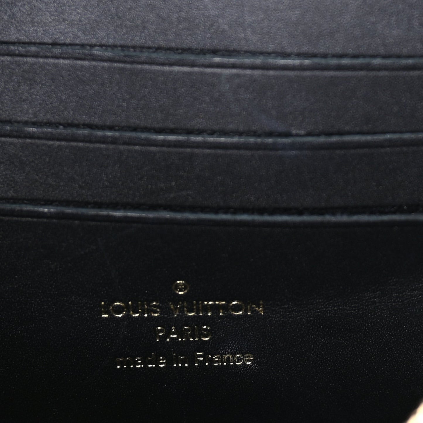 Reverse Monogram Dauphine Chain Wallet Brown