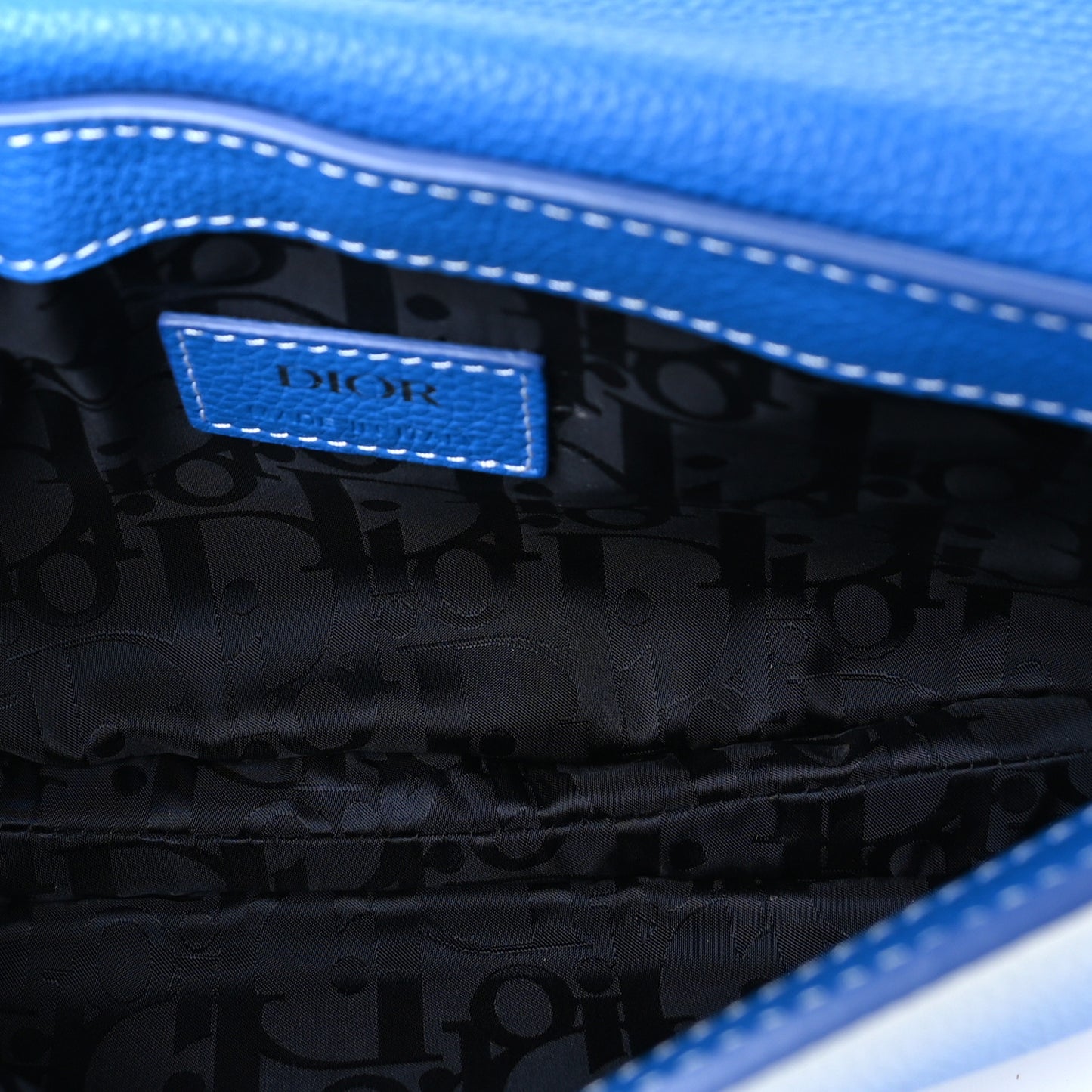 X KAWS Grained Calfskin Saddle Pouch Black