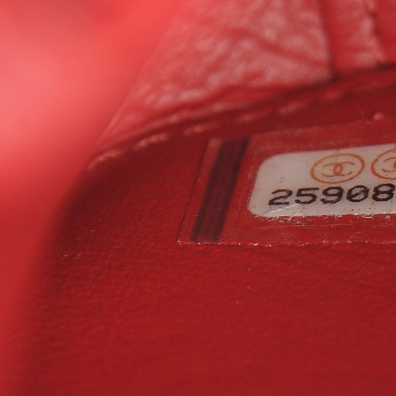 Caviar Quilted Medium CC Filigree Vanity Case Red